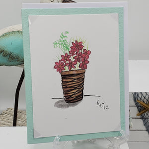 Red flowers in basket greeting cards